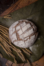 Freshly Baked Round Rye Bread On A Linen Napkin