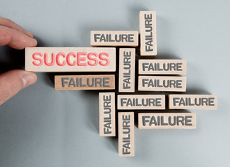 Wall Mural - Wooden Blocks with Failure and Success Concept