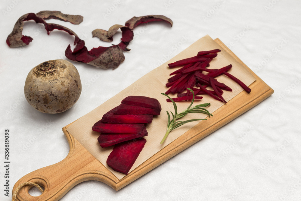 Raw beet fruit. Sliced beets on cutting board. Stock Photo | Adobe Stock