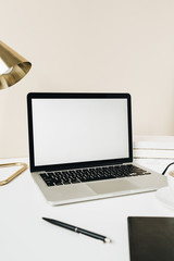 Wall Mural - Home office desk table workspace with blank screen laptop. Copy space mockup template.