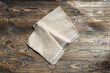 Linen napkin on wooden table, minimalism, rustic