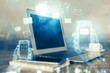 © peshkova - Desktop computer background in office and flying envelops hologram drawing. Multi exposure. Electronic mail concept.