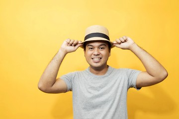 Handsome men in a good mood, bright yellow background room