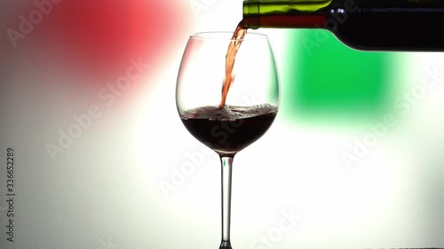pouring red wine glass from the bottle Canvas Print