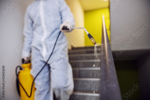 Sanitizing interior surfaces. Cleaning and Disinfection inside buildings, the coronavirus epidemic. Professional teams for disinfection efforts. Infection prevention and control of epidemic.
