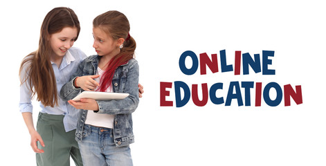 Online education concept. Two girls show a new application on a digital tablet. White background