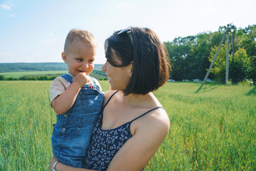 Sticker - happy mother and son in field