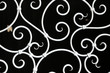 © leomalsam - Metal fence. Metal curly fence in the park