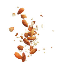 Whole And Crushed Almonds On A White Background