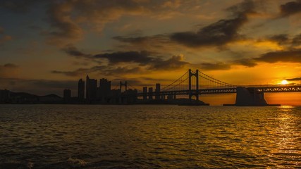 Wall Mural - Time Lapse 4k  Gwangan Bridge and Haeundae at Sunrise, Busan City, South Korea