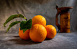 © Arbi - some fresh juice oranges with a old wooden jug