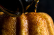 © Andrew Scrivani - Close up of rum being poured on baba au rum
