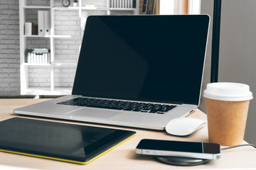 Wall Mural - Stylish office table desk. Workspace with laptop. Close up.