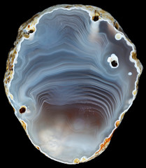 Slice of soft and smooth pattern agate geode on black. Russia, Kemerovo region, deposit Yachmenuha