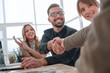 © ASDF - handshake business people at a meeting in the office