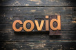 © enterlinedesign - Covid Concept Vintage Wooden Letterpress Type Word