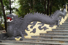 Big Grey Dragon About Stairway By Asia In Summer Sunny Day