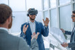 © ASDF - architect using virtual reality glasses in the workplace.
