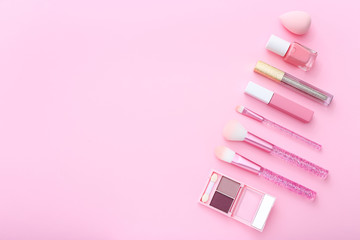 Poster - Makeup products on pink background. Top view