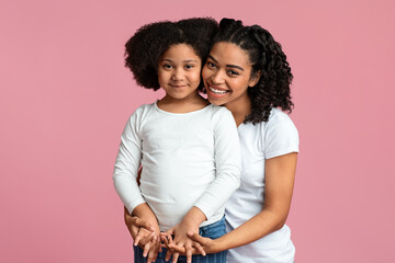 Children Adoption Concept. Happy Black Woman Posing With Her Foster Daughter