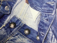 High Angle View Of Buttons On Jeans
