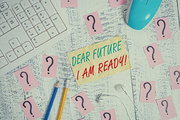 Wall Mural - Writing note showing Dear Future I Am Ready. Business concept for Confident to move ahead or to face the future Writing tools and scribbled paper on top of the wooden table