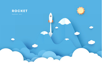 Sticker - Rockets glide over the mountains with views over the beautiful clouds on blue background. Business concept. Paper cut style. vector illustration