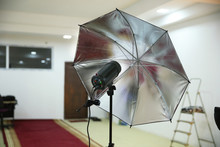 Photographic Studio Strobe Lighting And Reflective Umbrella . Photo Studio Silver Photo Studio Reflective Umbrella .