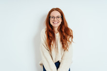 Smiling Friendly Young Woman Wearing Spectacles
