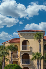 Wall Mural - Plaster tropical resort hotel with a red tile roof