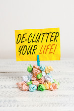 Word Writing Text De Clutter Your Life. Business Photo Showcasing Remove Unnecessary Items From Untidy Or Overcrowded Places Reminder Pile Colored Crumpled Paper Clothespin Reminder White Wooden Space