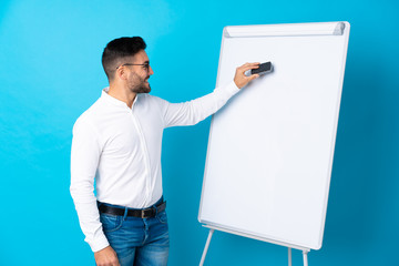 Sticker - Businessman giving a presentation on white board giving a presentation on white board