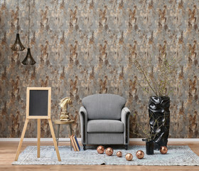 Modern grey wallpaper decor, background, armchair, black vase of plant and lamp.