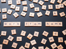 Wooden Scrabble Tiles And Words "work From Home"