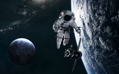 Wall Mural - astronaut, space station, planets in deep space against backdrop of spiral galaxy. science fiction. 