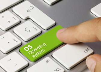 os operating system - inscription on green keyboard key.