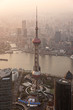 © Bisual Studio/Stocksy - Shanghai city skyline at sunset