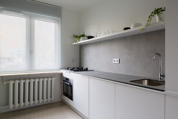 Canvas Print - Simple kitchen with vintage heater