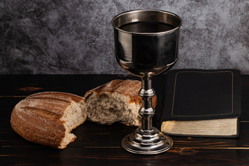 holy communion chalice with wine and bread