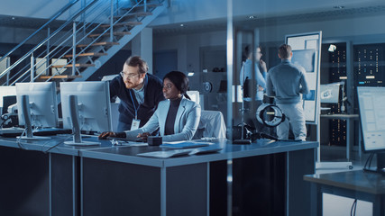 Poster - Electronics Development Engineer Working on PC, Talks with Project Manager. Team of Professionals Use CAD Software, Machine Learning and Neural Networks for Modern Industiral Engineering Design. 
