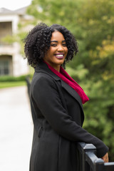 Wall Mural - Beautiful Confident African American Woman Smiling Outside