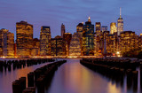 Fototapeta Nowy Jork - Waterfront skyline of New York City at night