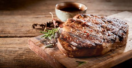 Close up of gourmet grilled steak and condiments