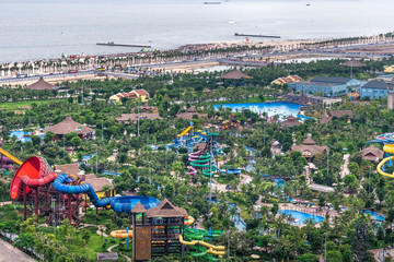 Wall Mural - Aerial view of Sun World Halong park, with Sun Wheels and underwater games. Halong City, Vietnam. Near Halong Bay, UNESCO World Heritage Site.