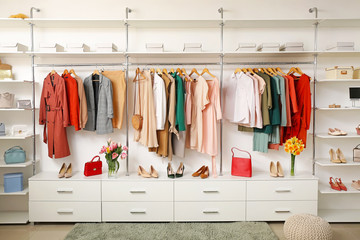 modern wardrobe with stylish spring clothes and accessories