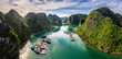 © Hien Phung - Aerial view of Cua Van floating fishing village and rock island, Halong Bay, Vietnam, Southeast Asia. UNESCO World Heritage Site. Junk boat cruise to Ha Long Bay. Famous destination of Vietnam
