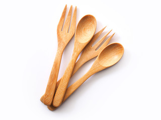 Wall Mural - wooden spoon and fork kitchen utensils isolated on white background.