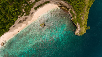 Top view on hardly accessible deserted beach.