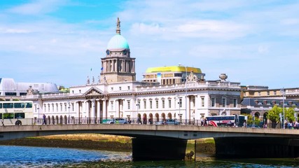 Sticker - Dublin, Ireland. The Custom house in Dublin, Ireland during the sunny day in summer. Time-lapse with moving transport at the bridge, zoom in