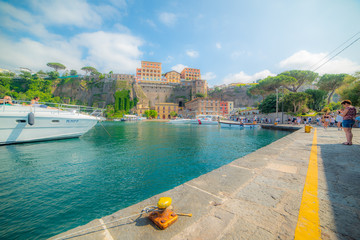 Wall Mural - People in Sorrento harbor on a sunny day